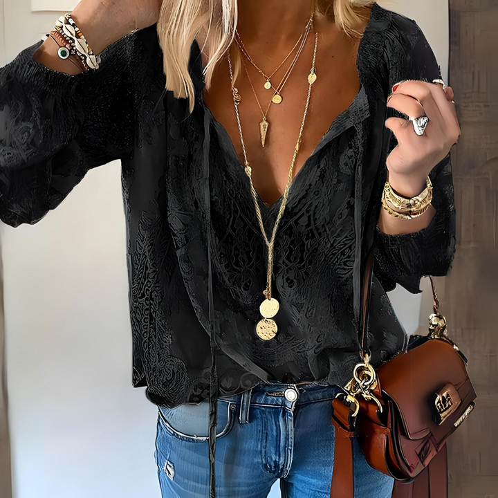 Chic Boho Blouse Featuring a Cutout Neckline