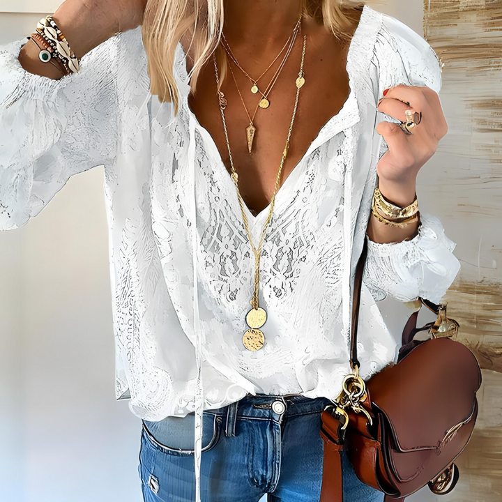 Chic Boho Blouse Featuring a Cutout Neckline