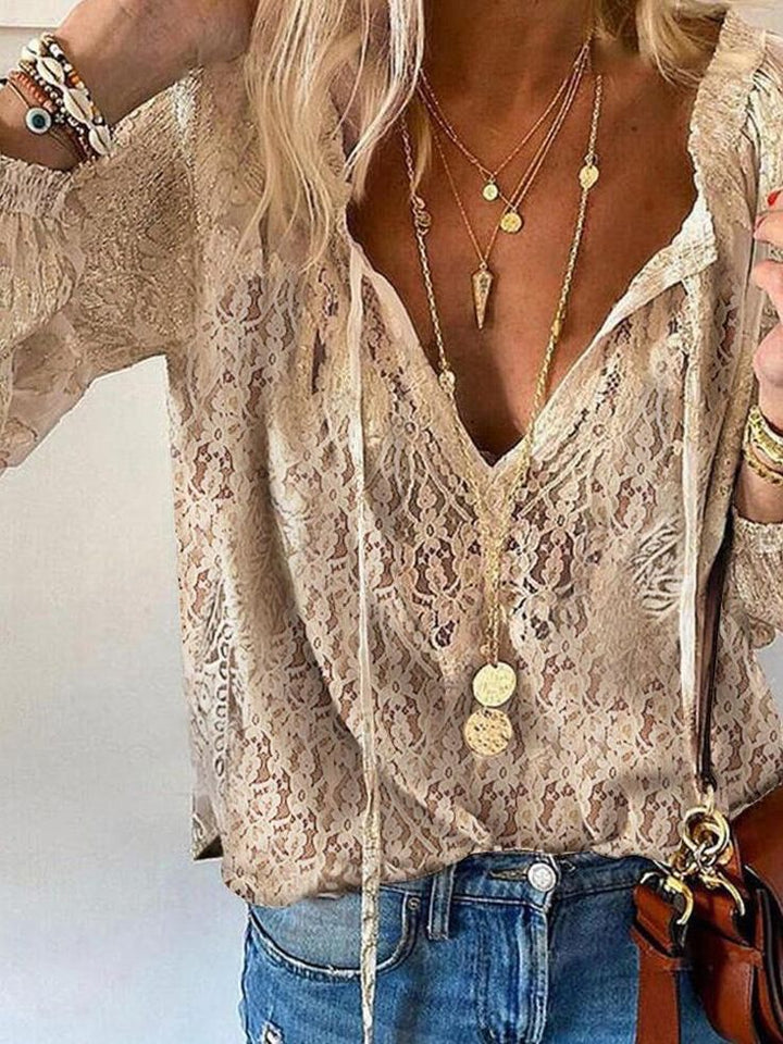 Chic Boho Blouse Featuring a Cutout Neckline